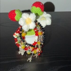 Set of (4) Bracelets with Charms